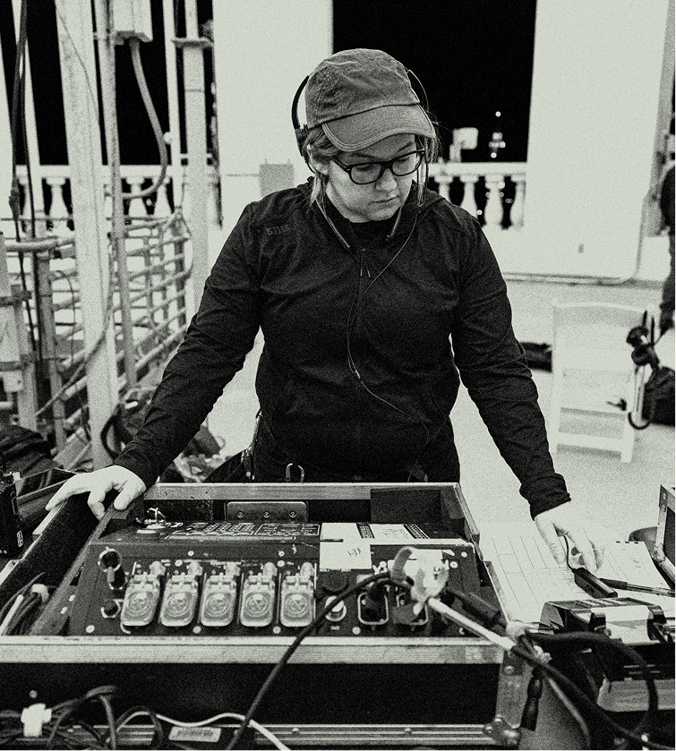 Pyrotecnico staff in front of launch console