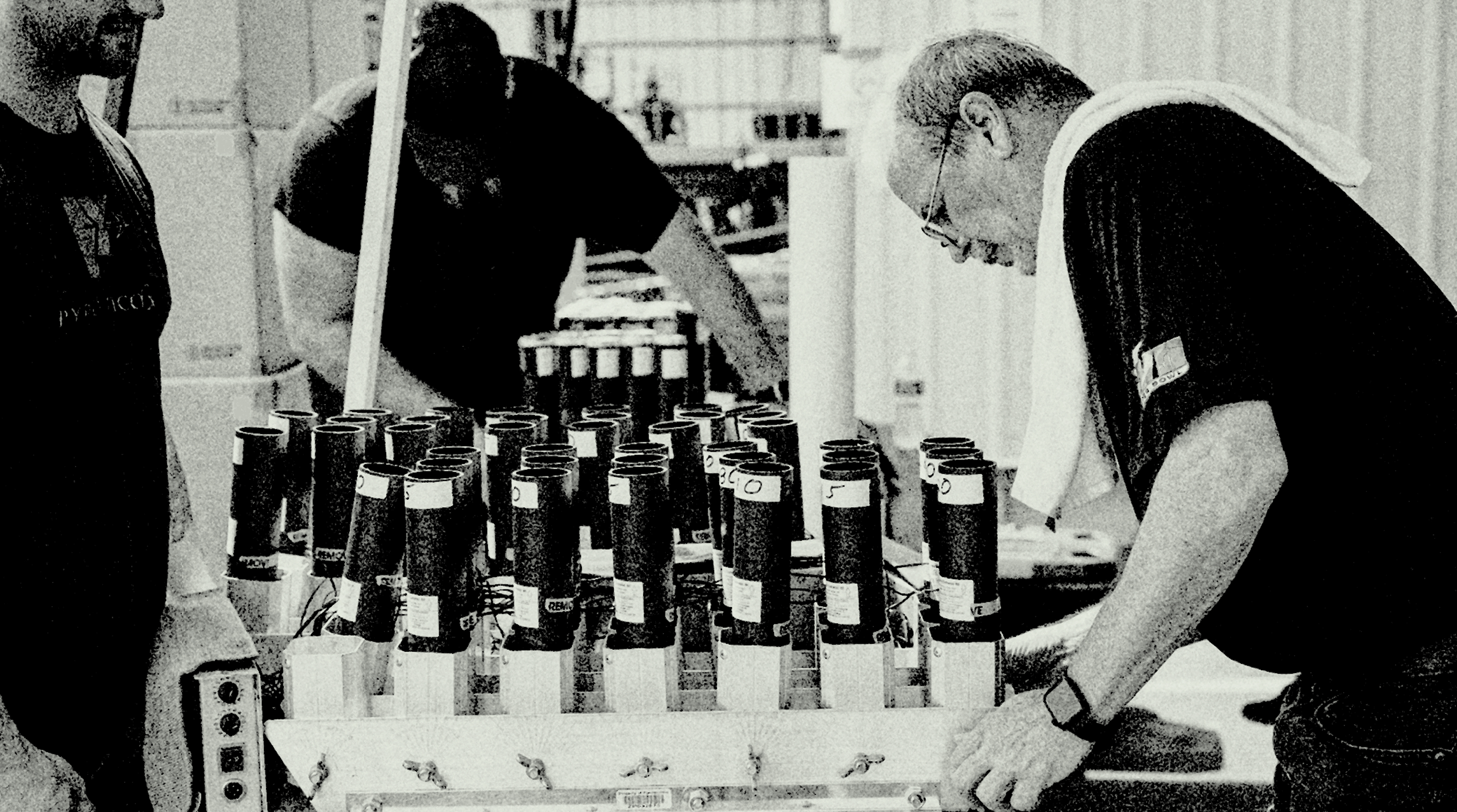 Pyrotecnico staff setting up fireworks mortars